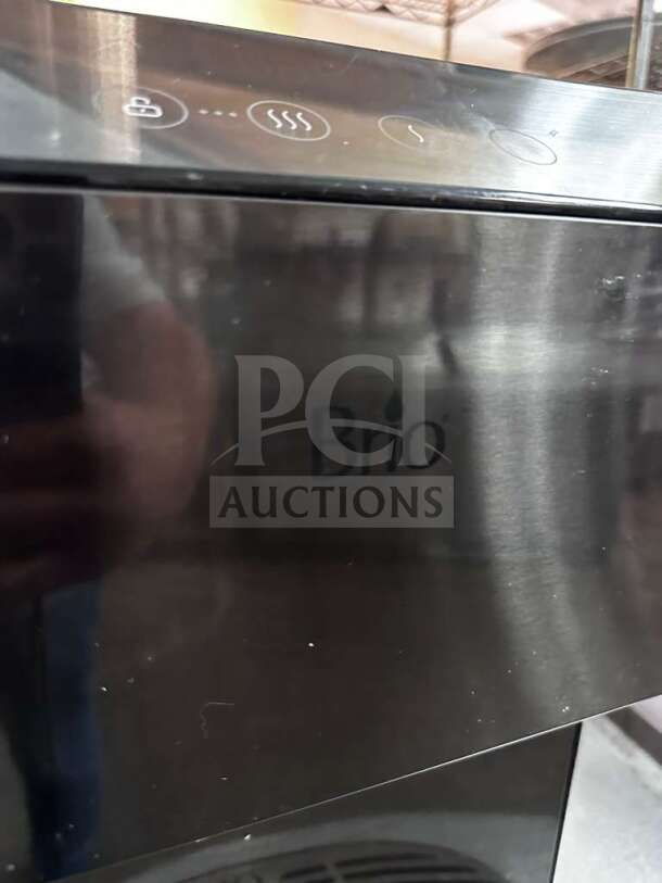 Brio Moderna CLCTPOU720UVF3B water cooler, black stainless, outstanding condition, tested, operational, with control icons visible.