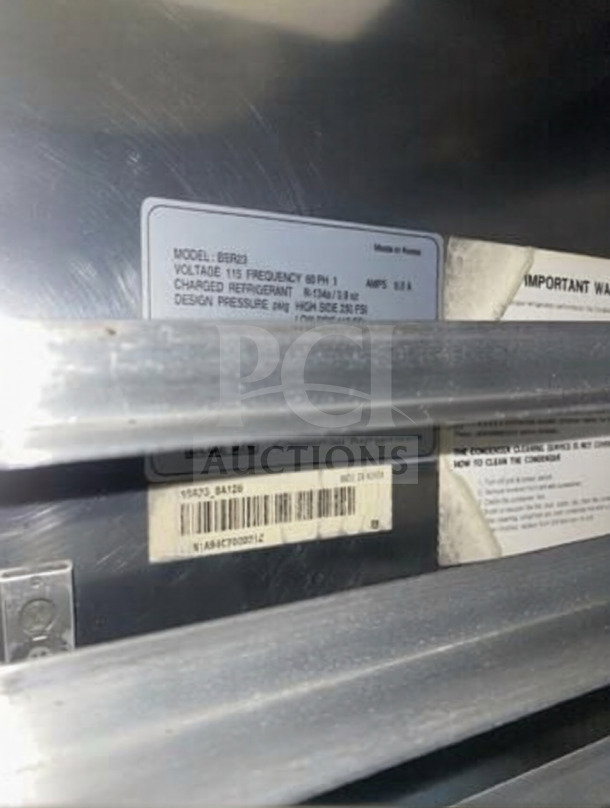 Blue Air BSR23-HC commercial refrigerator label showing model, voltage, and refrigerant details. Stainless steel, 26 inches.