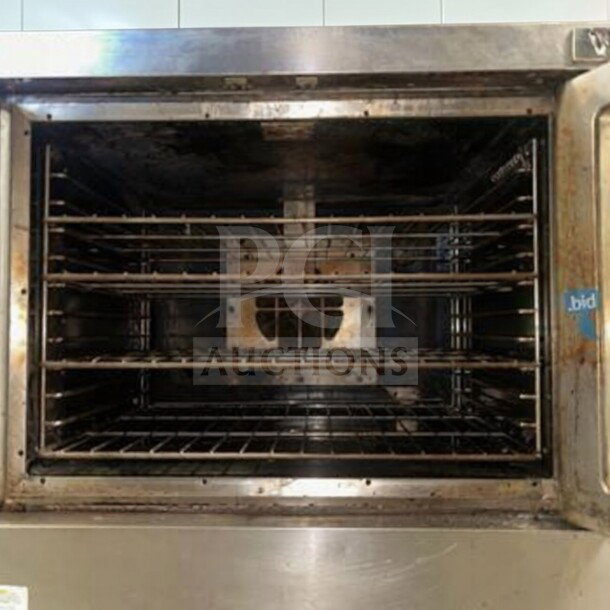 Vulcan VC5GD commercial gas convection oven in elite condition, single deck, fully operational, interior view with racks.