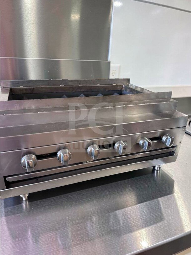 IDEAL 48" 6-burner commercial gas charbroiler in exceptional condition, stainless steel, fully tested, heavy-duty restaurant equipment.