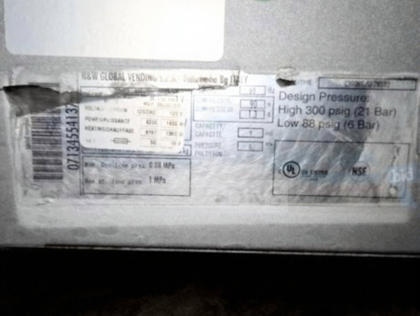 Label on Select Brew NG-300 coffee system indicating power usage, pressure specifications, and safety certifications.