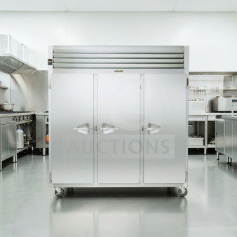 Traulsen G31310 reach-in freezer, 77" three-section solid doors, stainless steel, excellent condition, tested operational.