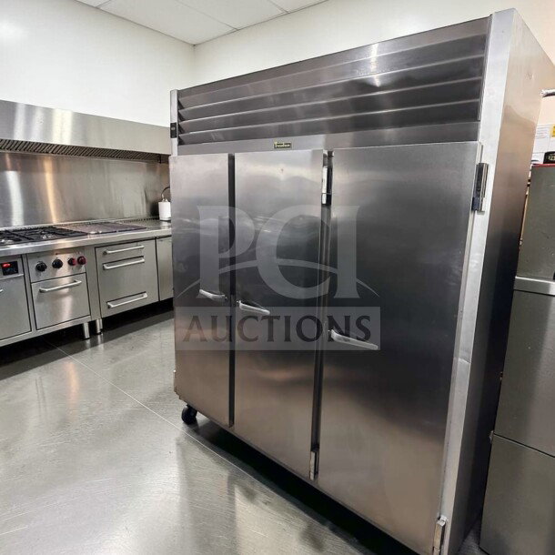 Traulsen G31310 reach-in freezer, 77" three-section solid doors, stainless steel, elite condition, fully tested operational.
