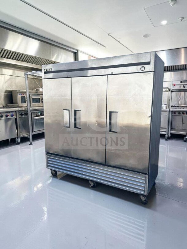 Three-door True T-72F commercial reach-in freezer in immaculate condition. Stainless steel, fully tested, 78 inches.