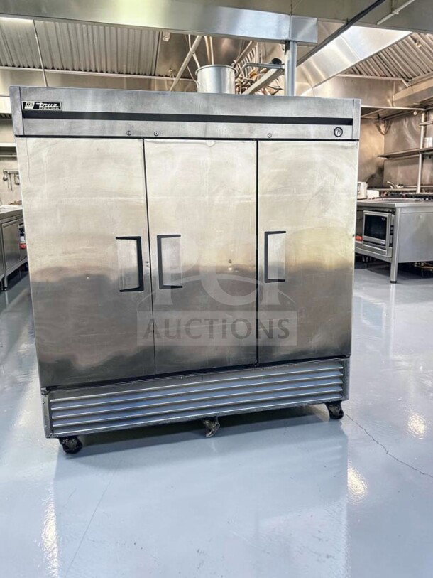 True T-72F commercial 3-door reach-in freezer, stainless steel, 78", immaculate condition, fully tested, True logo visible.