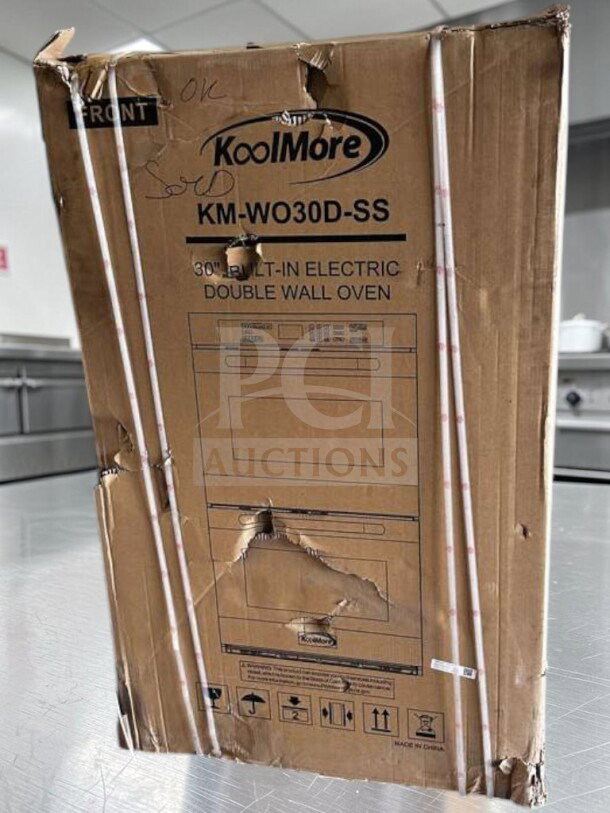 KoolMore KM-WO30D-SS 30” built-in electric double wall oven in original packaging. Box shows wear. Model and brand visible.