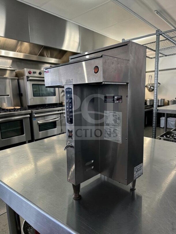 FETCO CBS-2042E commercial coffee brewer in excellent condition, stainless steel, fully operational, high-volume system.