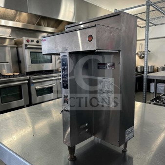 FETCO CBS-2042E commercial coffee brewer in excellent condition, stainless steel, fully operational, high-volume system.
