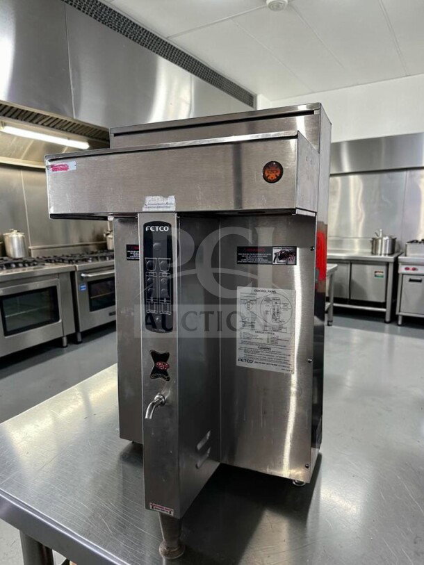 FETCO CBS-2042E commercial coffee brewer, stainless steel, superior condition, high-volume brewing, visible control panel.