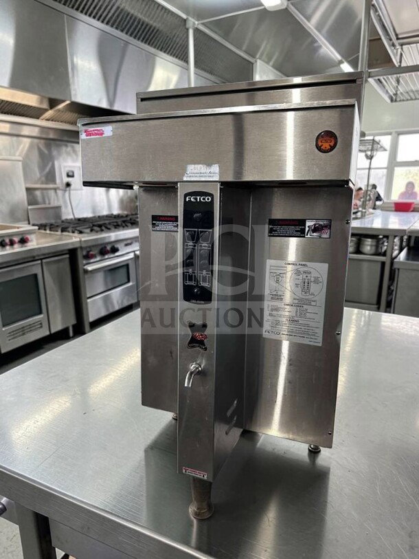 FETCO CBS-2042E commercial coffee brewer in superior condition, 120/208-240V, stainless steel, high-volume brewing system.