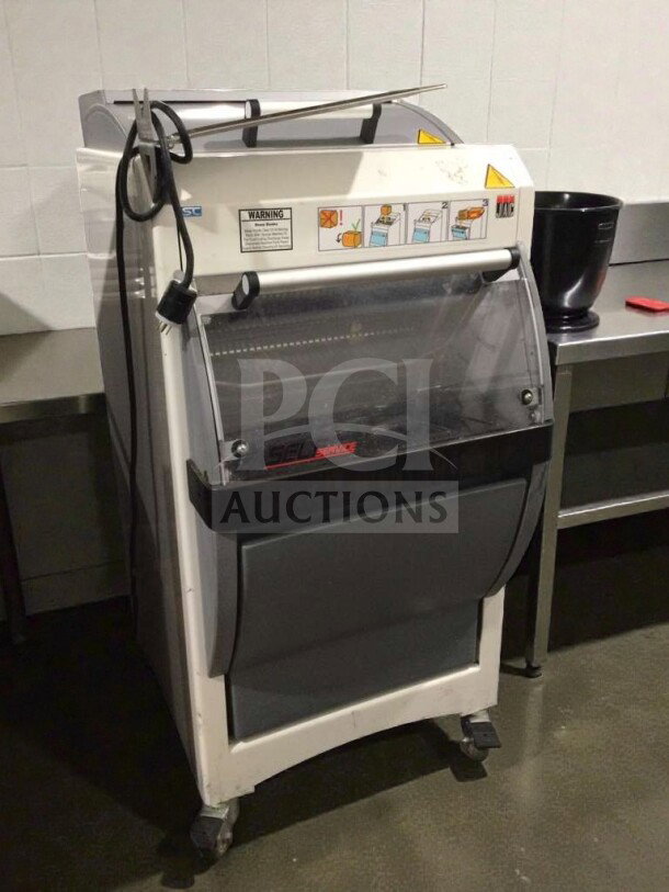 JAC KG-12FS commercial bread slicer, 115V, single phase, fully tested, features visible labels, in refined condition.