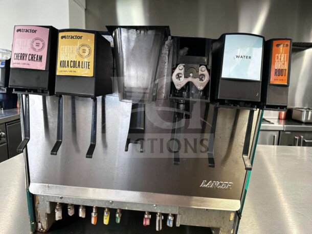 Lancer soda fountain dispenser, multi-valve, labels for Cherry Cream, Kola Cola Lite, Water, Cert Orga Root, stainless steel.
