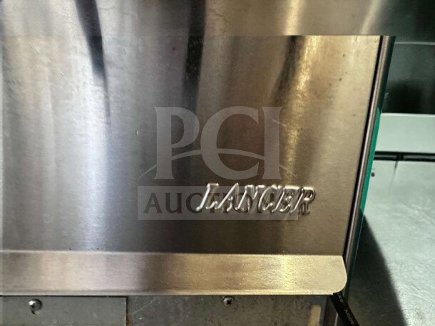 Lancer Multi-Valve Soda Dispenser, stainless steel, superior condition, fully tested, Lancer logo embossed front.