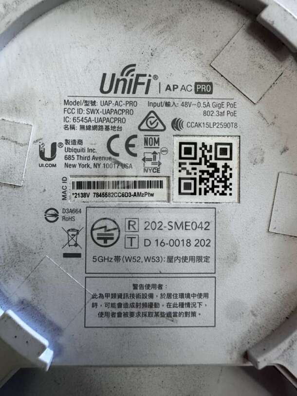 Ubiquiti UniFi UAP-AC-PRO wireless access point bottom view showing model details and labels.