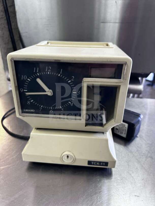 AMANO TCX-11 Time Clock Recorder, prime condition, automatic time stamp, model 5477, fully tested and operational.
