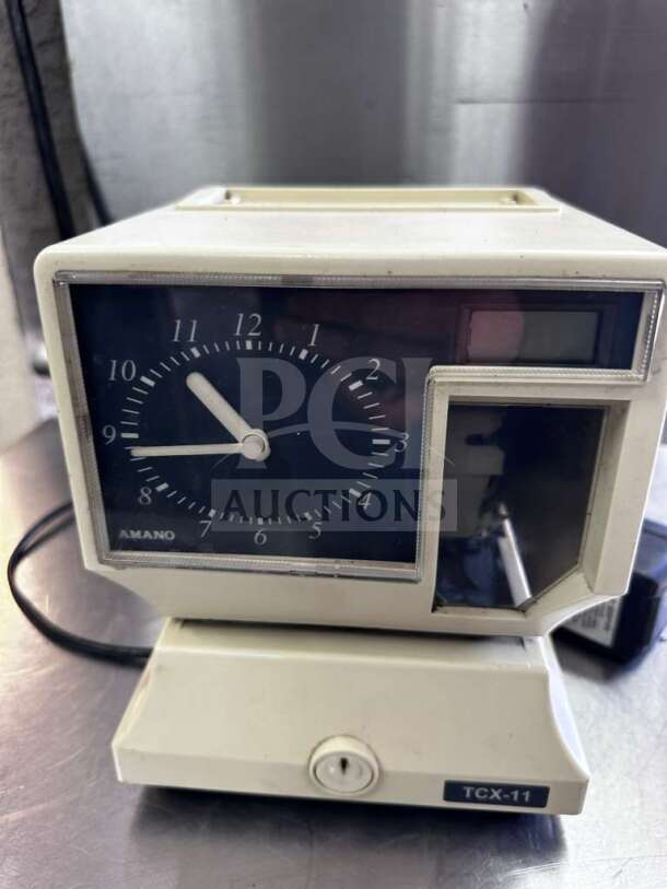 AMANO TCX-11 time clock recorder, model 5477, automatic employee time stamp, prime condition, fully tested, operational.