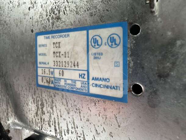 AMANO TCX-11 time clock label, serial 332129244, UL listed, 16.5V, 60Hz, Made in USA. Model TCX-11 / 5477.