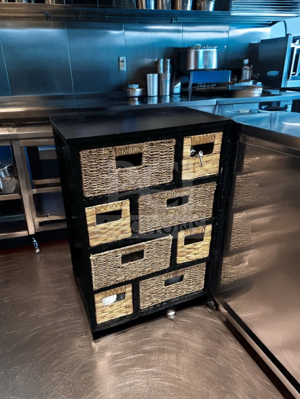 Compact multi-drawer storage cabinet with woven basket drawers in remarkable condition. Model: STO-S-CAB-0926. Fully functional.