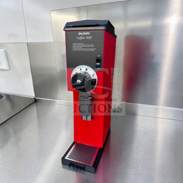 Commercial-grade red Bunn G3 HD coffee grinder, model 22100.0001, in elite condition. Fully tested and operational.