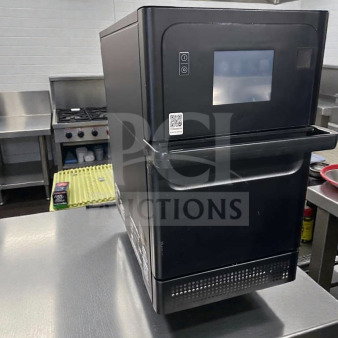 Merrychef Commercial High-Speed Oven, touchscreen control, model MER-L-OVN-0368, in top-tier condition on stainless steel table.