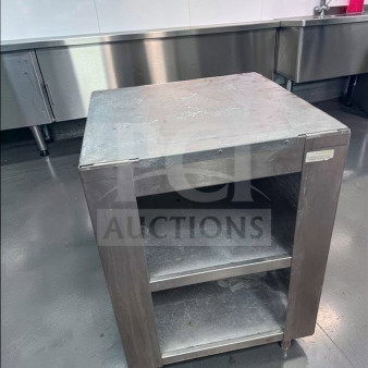 Commercial stainless steel equipment stand in excellent condition, featuring two open shelves for storage, model COM-S-STD-0687.