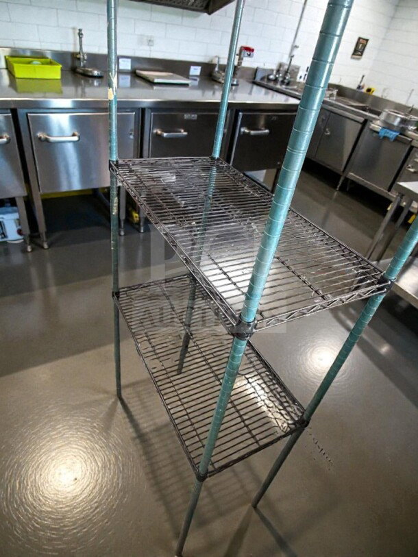 4-tier heavy-duty commercial wire shelving rack in excellent condition, NSF style, STO-S-RACK-0355 model, fully inspected.