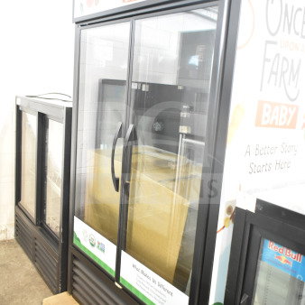 BRAND NEW 2026 True TVM-48SL-HC cooler, commercial 2-door, 115V, scratch and dent, merchandiser graphic visible.