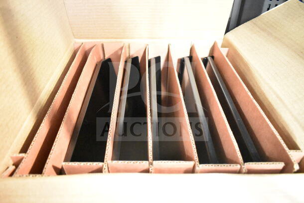 Cardboard packaging encasing panels for a True TVM-48SL-HC commercial cooler. New, scratch, and dent condition.