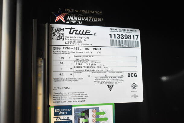 BRAND NEW SCRATCH AND DENT 2026 True TVM-48SL-HC Commercial 2 Door Cooler. 115V, 1 Phase, detailed spec label shown.