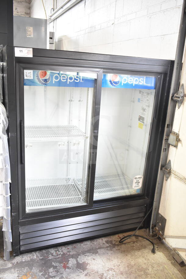 True GDM-41SL-60-LD commercial 2 door cooler merchandiser, Pepsi branding, 115 volts, 1 phase, in good condition.