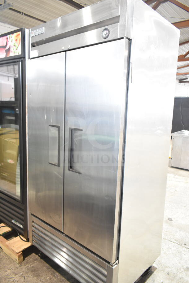 2017 True T-35 2-door reach-in cooler, commercial grade, on casters, stainless steel, 115 volts, 1 phase.