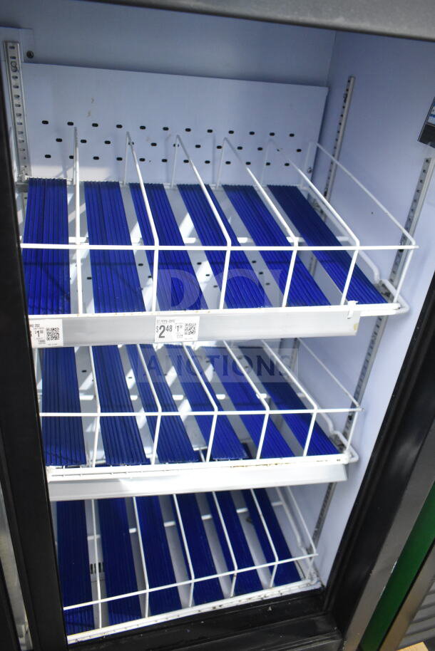 QBD CD4154SL commercial 2-door reach-in cooler merchandiser with blue wire shelves, 115 volts, 1 phase, features price labels.