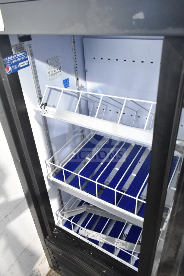 QBD CD4154SL Commercial 2 Door Reach-In Cooler Merchandiser with shelves, 115 Volts, visible service labels.