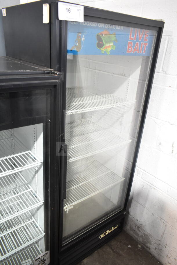 True GDM-12 commercial single door cooler merchandiser, glass front, multiple shelves, 115 volts, used condition.