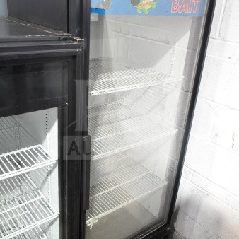 True GDM-12 commercial single door cooler merchandiser, glass front, multiple shelves, 115 volts, used condition.