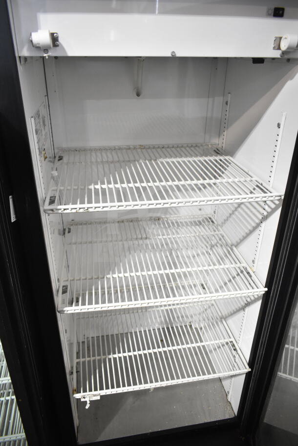 True GDM-12 commercial cooler, single door, white interior, three adjustable shelves, 115V, 1 phase, clean condition.