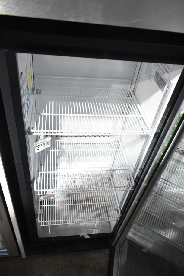 2019 IDW G4-H0234B commercial reach-in cooler with a single door, 115 volts, 1 phase, visible shelves, good condition.