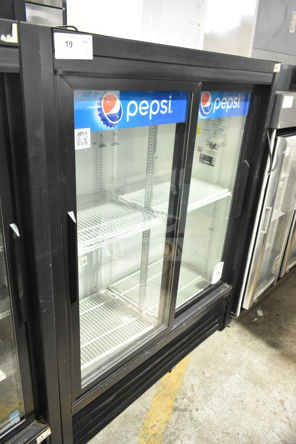 True GDM-41SL-60-LD cooler, commercial 2-door merchandiser, Pepsi branding, 115 volts, excellent condition.