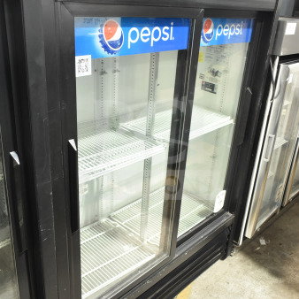 True GDM-41SL-60-LD cooler, commercial 2-door merchandiser, Pepsi branding, 115 volts, excellent condition.