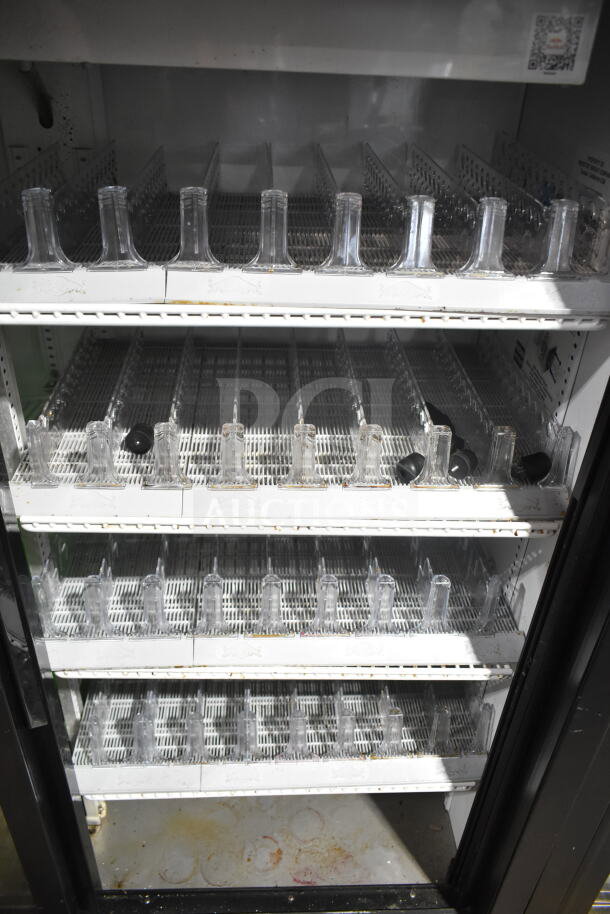True GDM-41SL-60-LD 2 Door Cooler Merchandiser, shelves, 115 volts, commercial use, interior view, used condition.