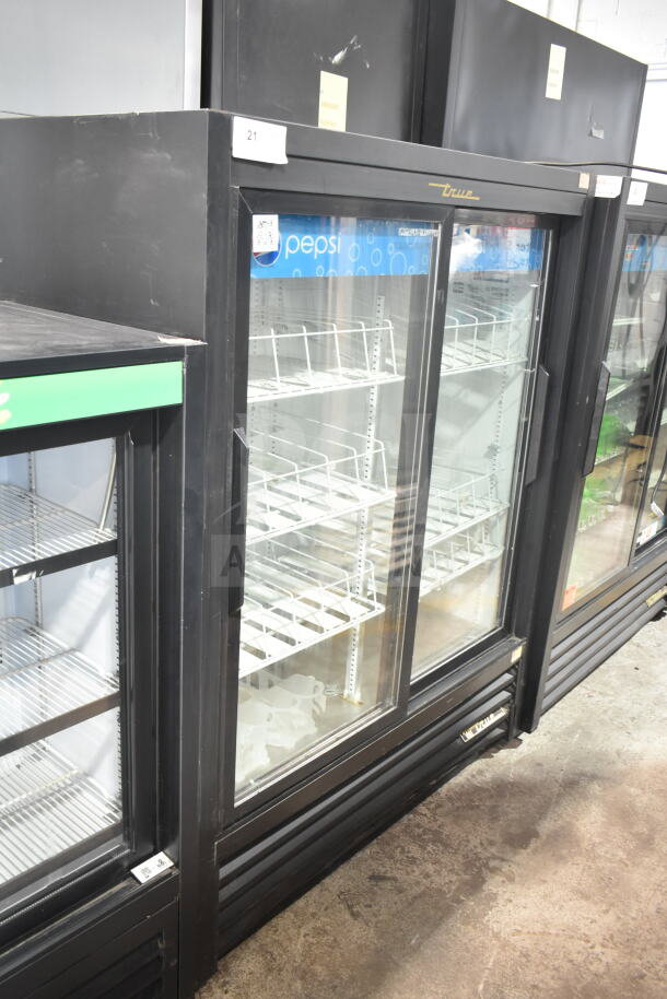 True GDM-41SL-60-LD 2 Door Cooler Merchandiser, black exterior, glass doors, shelving, 115V, used condition.