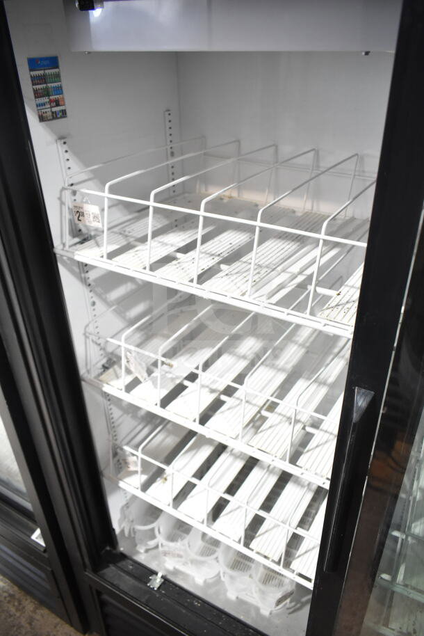 True GDM-41SL-60-LD commercial cooler, 2 doors, white wire shelving, 115V, 1 phase, clean interior, minor wear.