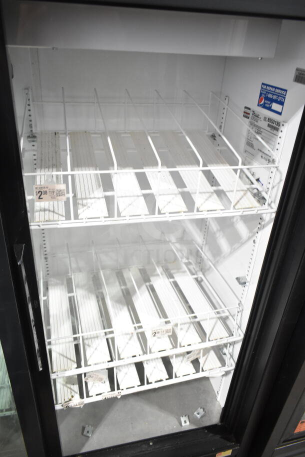 True GDM-41SL-60-LD Commercial 2 Door Cooler Merchandiser, 115V, 1 Phase, shelves visible, good condition, service label inside.