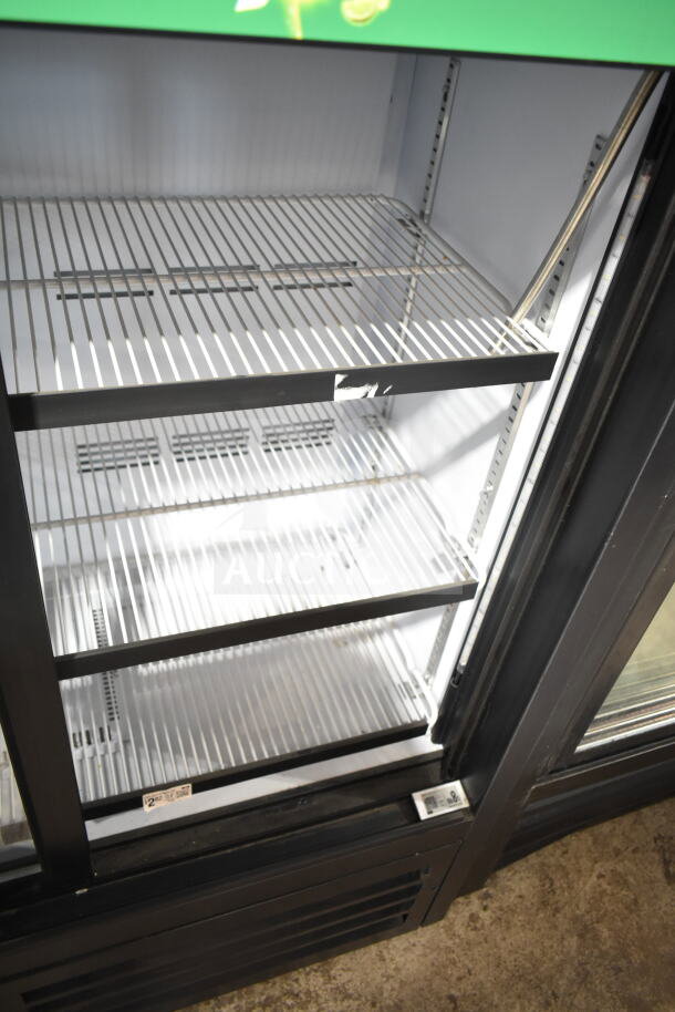 QBD CD4148SL-HC Commercial Cooler, 2 door, metal shelves, 115V, good condition, interior view, model label visible.
