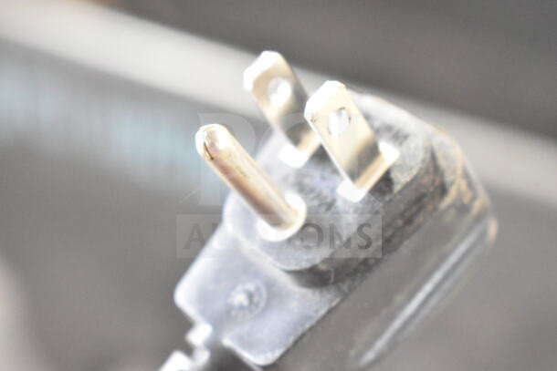 Close-up of electrical plug for QBD CD4148SL-HC Commercial 2 Door Reach In Cooler, 115 Volts, 1 Phase.