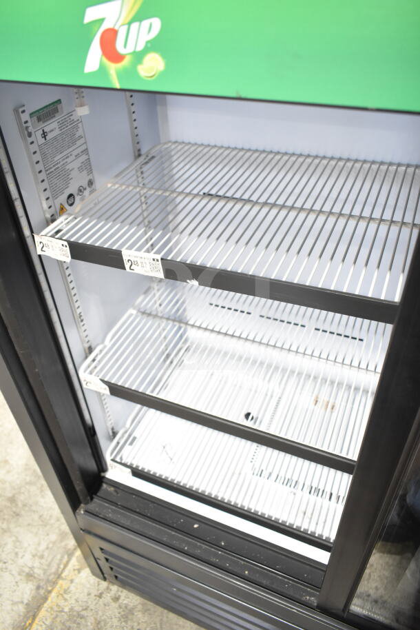 QBD CD4148SL-HC Commercial 2 Door Reach In Cooler Merchandiser, 115V, 1 Phase, with 7-Up branding, in good condition.