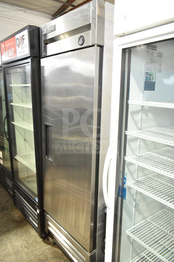 True T-19F Commercial Single Door Reach-In Freezer, stainless steel finish, 115 Volts, 1 Phase, temperature gauge on top.