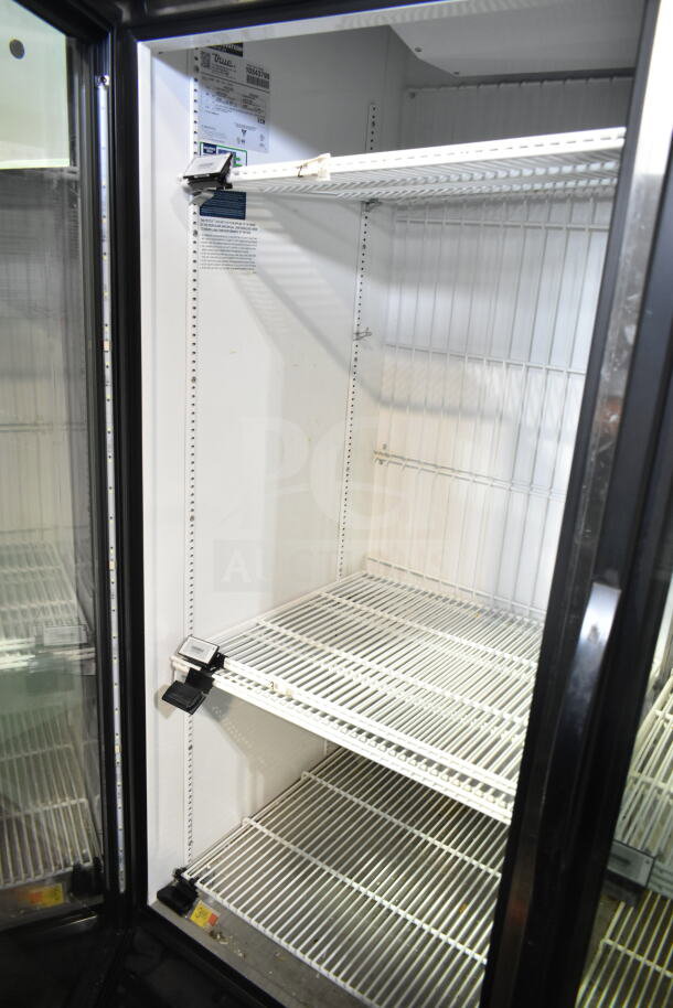 2021 True GDM-49F-HC commercial cooler, dual glass doors, three adjustable shelves, 115V, 1 phase, excellent condition.