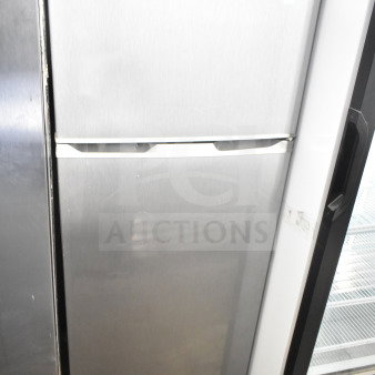 Frigidaire EFR780-T-6COM reach-in cooler with freezer, 115 volts, 1 phase, stainless steel finish, model label visible.