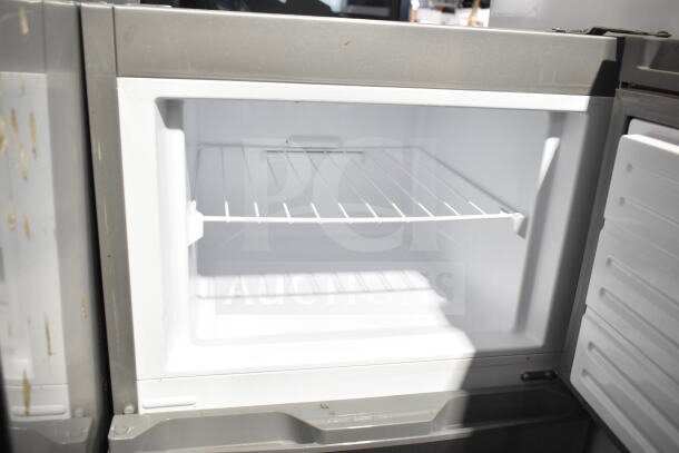 Frigidaire EFR780-T-6COM Reach-In Cooler with Freezer, 115V, 1 Phase, open interior view showing shelves.